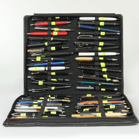 Colorful pens in open case
