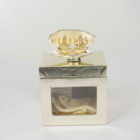 Silver Gold metal Laxmi Ganesh statue in a original shell